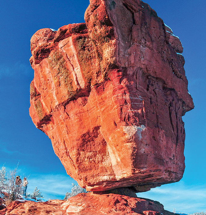A large boulder balancing on one of its corners