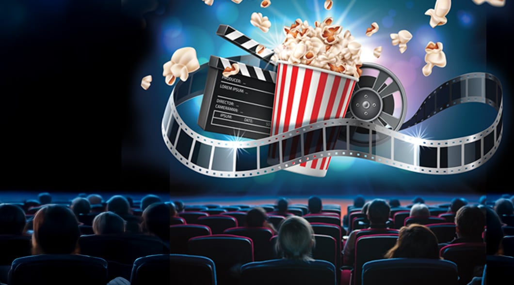 mage of people sitting down at a movie theatre