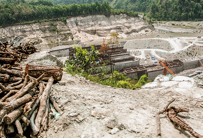 A barren landscape with trees chopped down